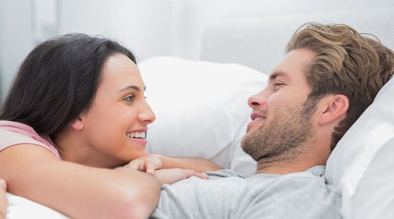 The young couple on the bed