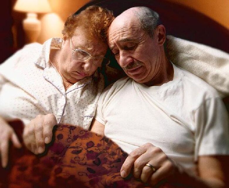 the old couple on the bed